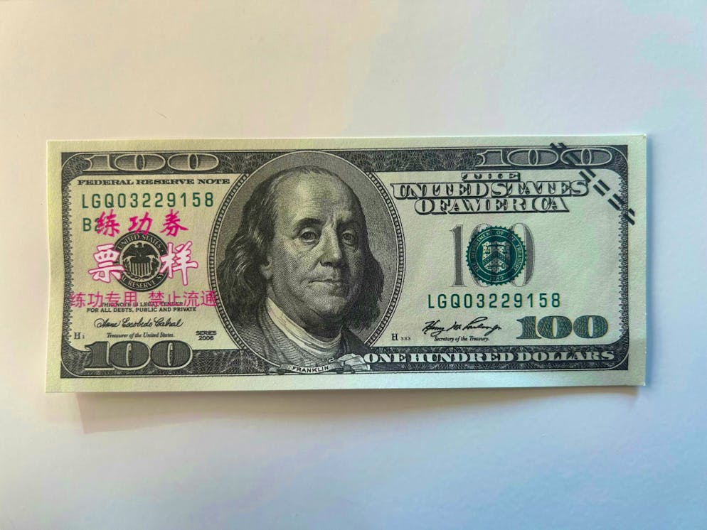This is what forbidden counterfeit money looks like. These 100-dollar notes are often used at Chinese festivals.