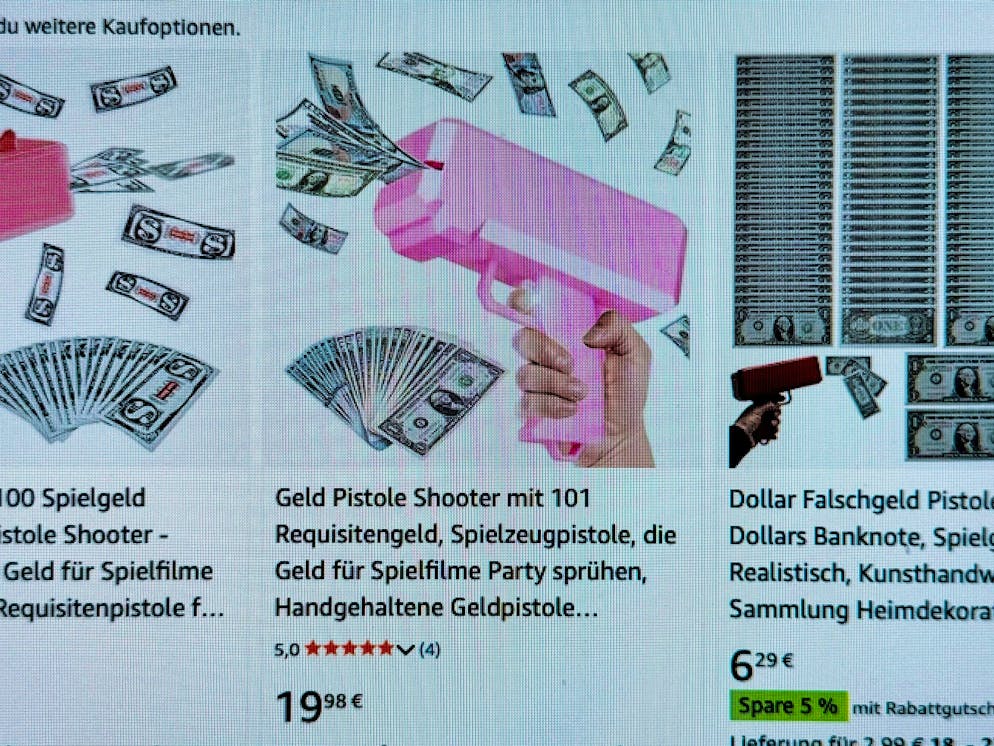 Money guns with counterfeit money are being offered on the Internet.