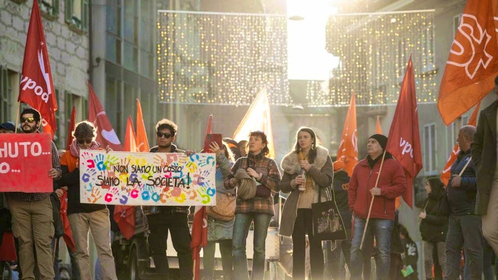 500 people demonstrate in Ticino against austerity measures - Gallery. "We are not a cost item, we are society!" read a poster held by demonstrators in Bellinzona. The rally was held against the backdrop of renewed austerity measures by the Ticino government.