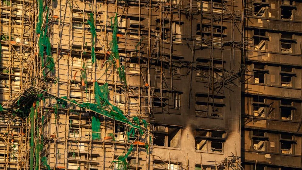 dpatopbilder - Blick auf eines der verbrannten Gebäude in Hongkong. Foto: Vernon Yuen/Nexpher via ZUMA Press Wire/dpa