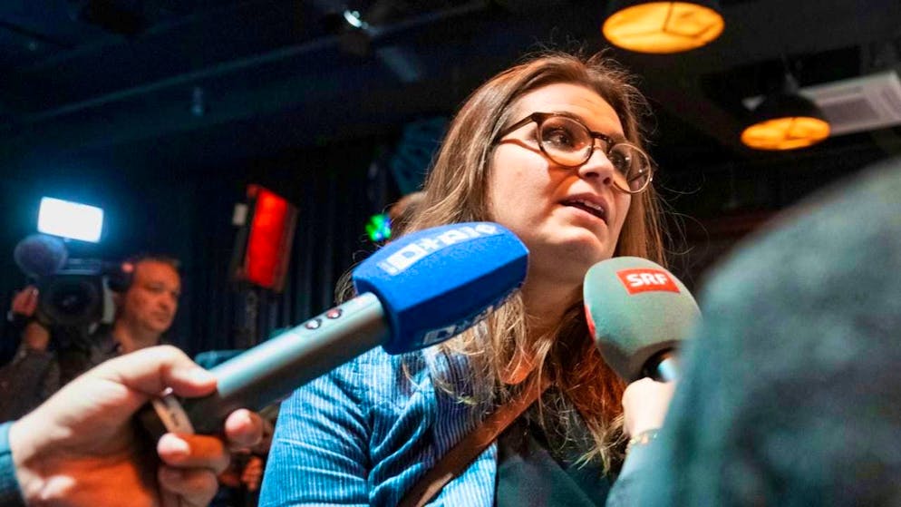 Noémie Roten, President of the initiative committee, comments on the result of the vote to media representatives.