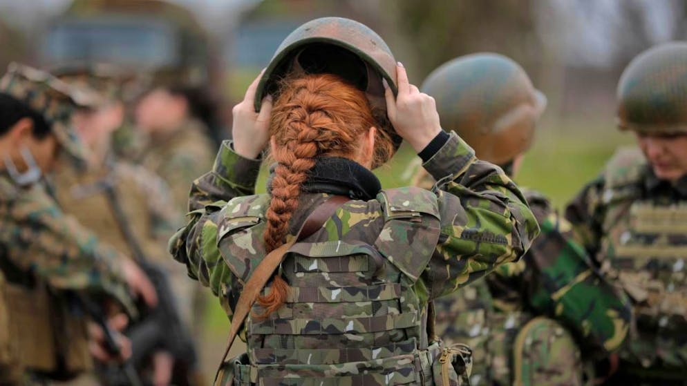 Le peuple suisse se prononce sur deux initiatives populaires - Gallery. L'initiative service citoyen demande que tous les jeunes, y compris les femmes, s'engagent pour la Suisse, que ce soit au sein de l'armée, de la protection civile ou d'une autre organisation (archives).