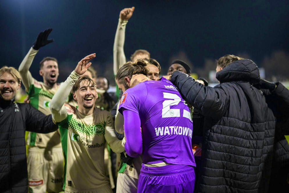 The St.Gallen players cheer goalkeeper Lukas Watkowiak after the penalty shoot-out.