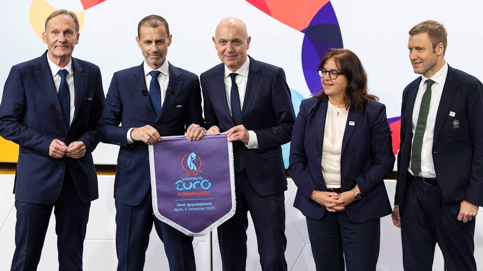 From left, UEFA Vice-President Hans-Joachim Watzke, UEFA President Aleksander Ceferin, German Football Association (DFB) president Bernd Neuendorf, German Football Association (DFB) Vice-President Heike Ullrich and General Secretary of the German Football Association (DFB) Holger Blask, pose during the the announcement ceremony for the host country of the UEFA Women's EURO 2029, in Nyon, Switzerland, Wednesday, Dec. 3, 2025. (Cyril Zingaro/Keystone via AP)