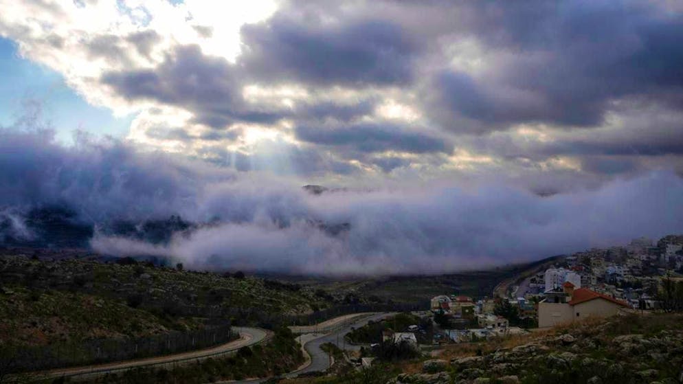 ARCHIVE - Fog lies on the area in the buffer zone near the so-called Alpha Line, which separates the Israeli-controlled Golan Heights from Syria. Photo: Matias Delacroix/AP/dpa