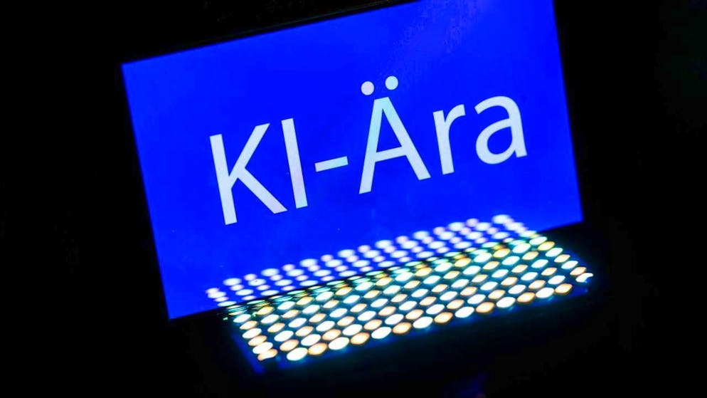 PRODUCTION - The word "KI-Ära" can be seen on a smartphone. The word of the year is "KI-Ära", as announced by the German Language Society (GfdS). Every year, a jury of experts selects a list of words that have hit the linguistic nerve of a year in a special way. Photo: Robert Michael/dpa
