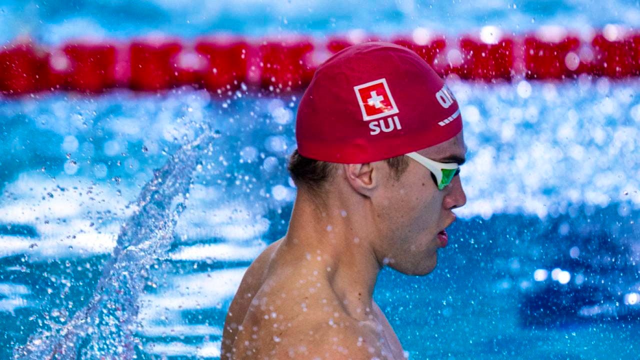 Swimming. Swiss medley relay with record in final