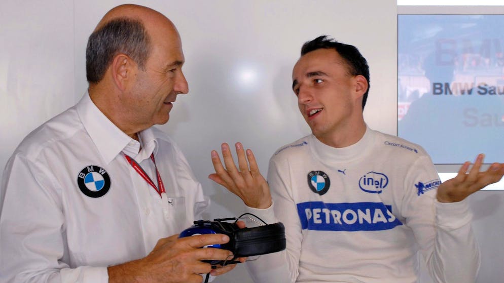 Peter Sauber und Robert Kubica im Gespräch in Monza 2006.