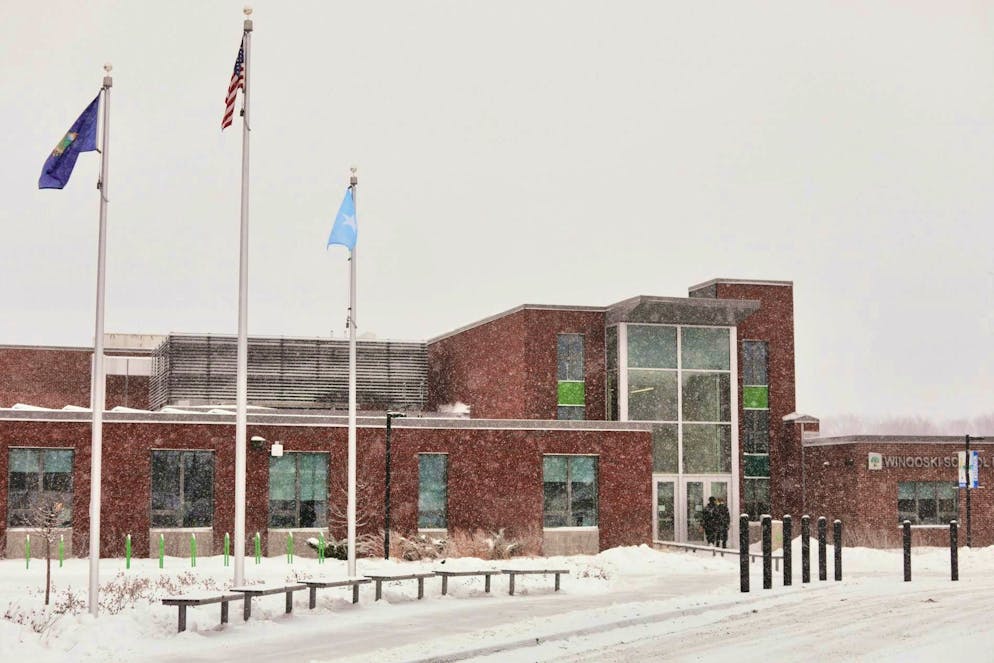 A Somali flag next to the US flag at the school in Winooski.