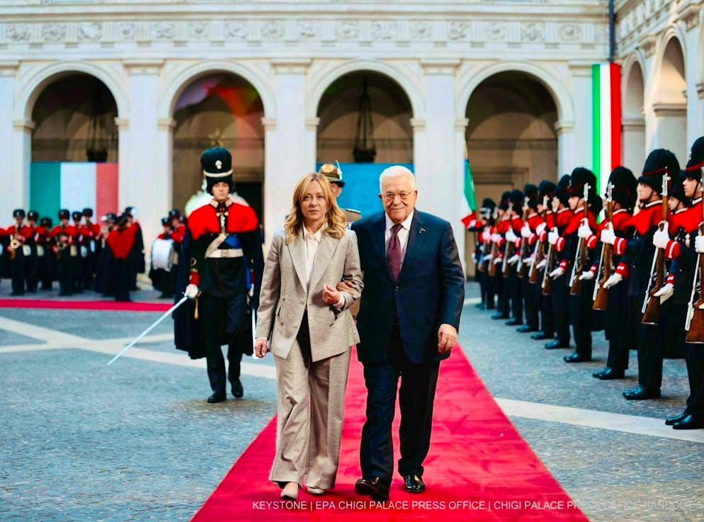 Italian Prime Minister Giorgia Meloni (l.) welcomes Palestinian President Mahmoud Abbas at Palazzo Chigi in Rome, Italy, on December 12, 2025.