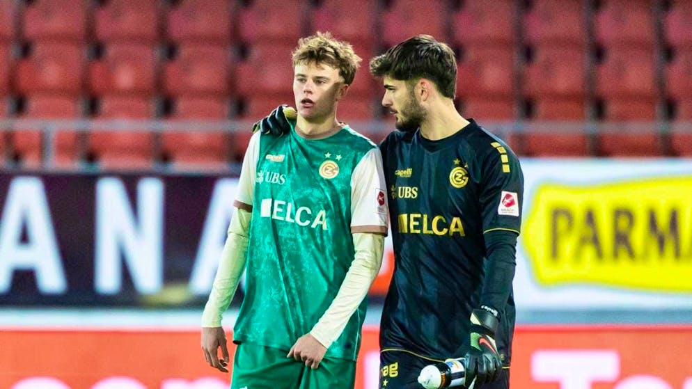 Jonathan Asp Jensen (is comforted by GC goalie Justin Hammel