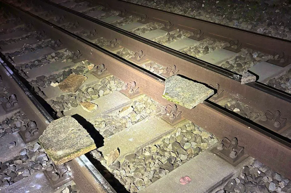The slabs placed on the tracks broke as the train passed through.