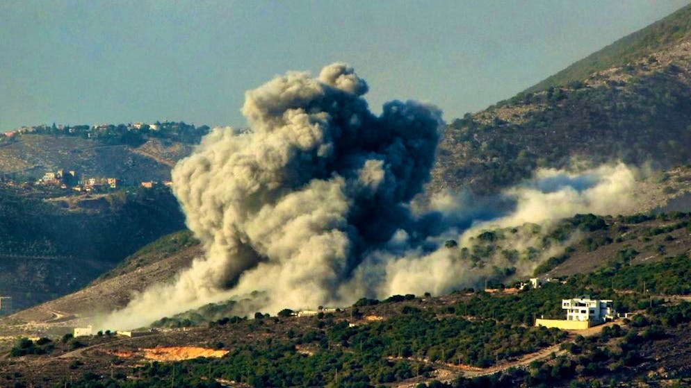 ARCHIVE - Smoke billows after Israeli air strikes on Hezbollah positions in the southern Lebanese village of Mahmoudieh. Photo: Stringer/dpa