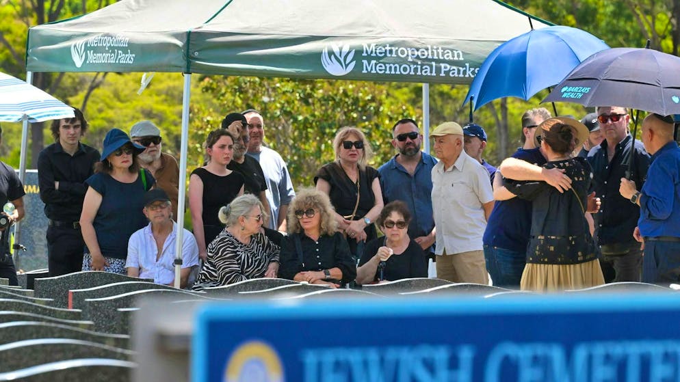 Mourners at the funeral of one of the victims of the terrorist attack at Bondi Beach. (December 19, 2025)