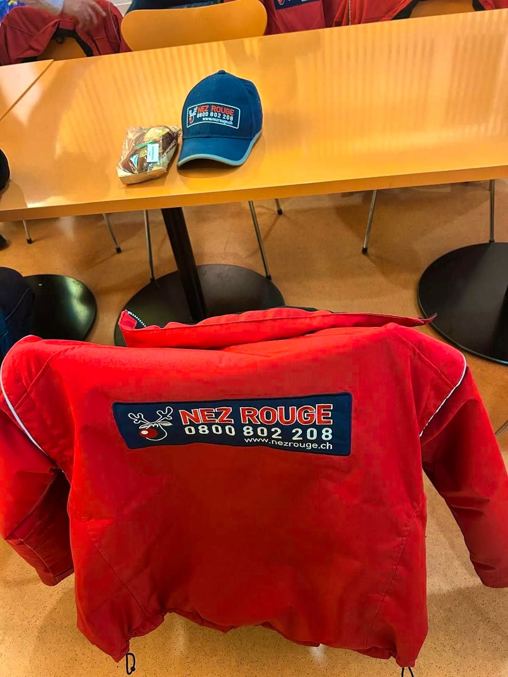 On the road with Nez Rouge of the Lucerne section. The drivers' red jackets are the Nez Rouge trademark.