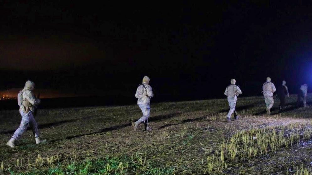 Turkish army officers and rescue teams search for the remains of a private jet. Photo: Efekan Akyuz/AP/dpa