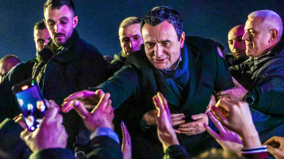 Albin Kurti, acting Prime Minister of Kosovo and leader of the political party VeteVendosje, greets supporters in Pristina on Sunday.