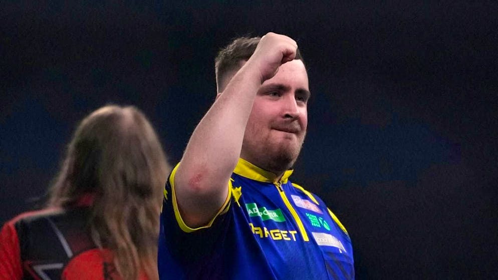 Top favorite and defending champion Luke Littler strolls into the World Championship final.