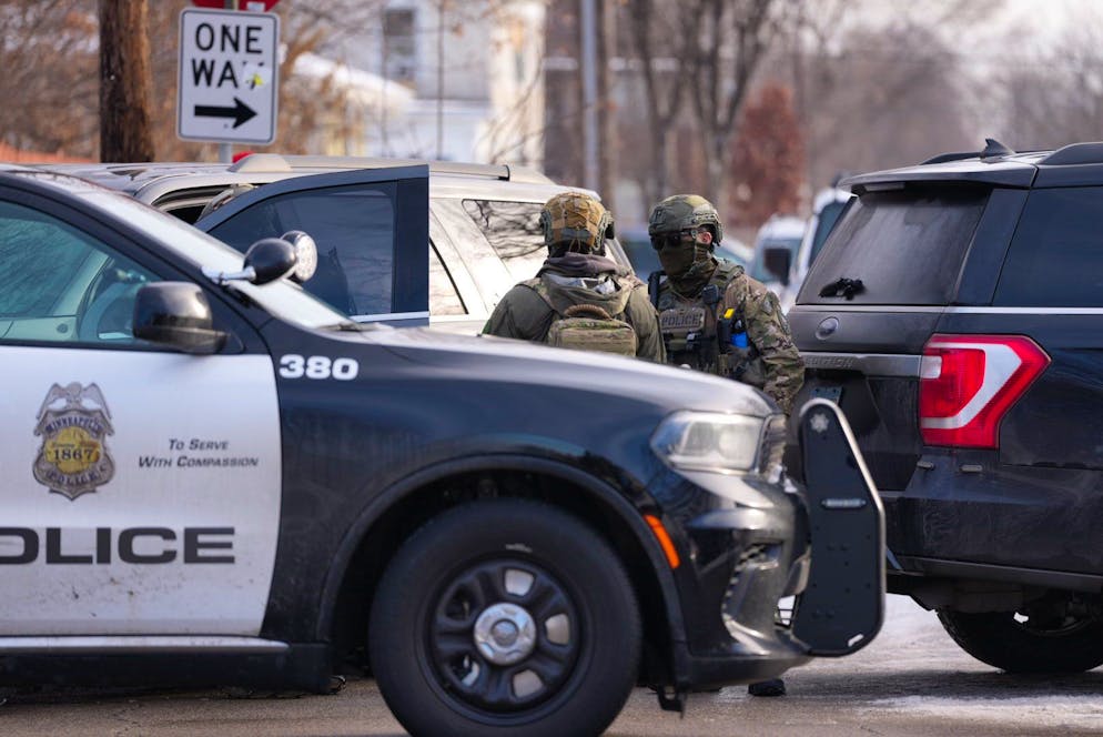 Law enforcement officials respond to the scene of a shooting in Minneapolis,  on Wednesday, Jan. 7, 2026. (Alex Kormann/Star Tribune via AP)