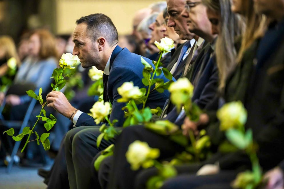 Mathias Reynard with a white rose.