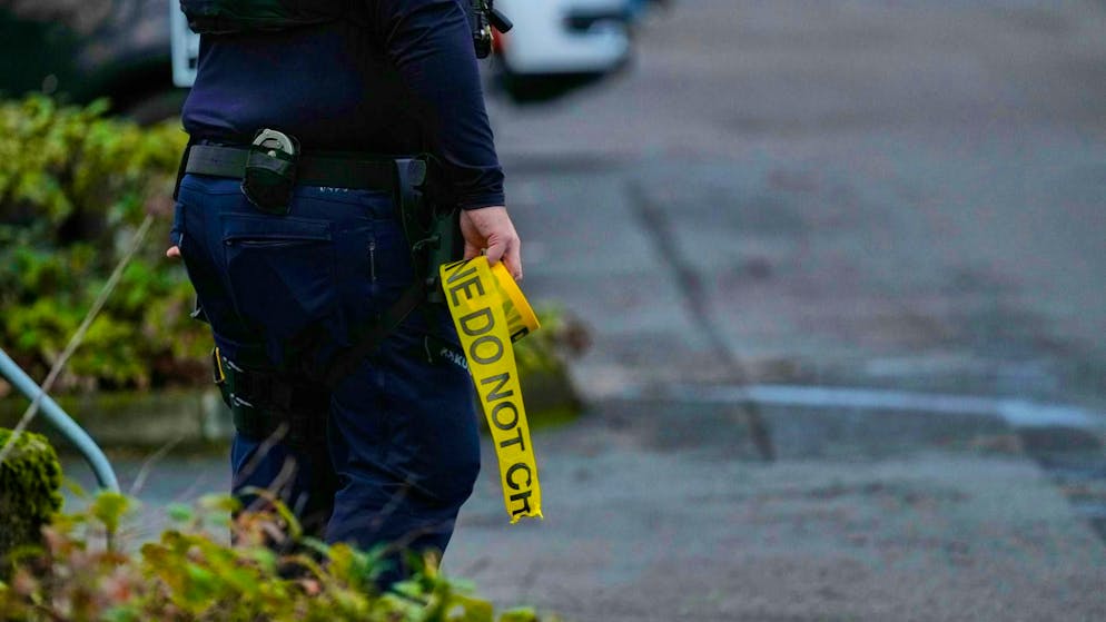 Law enforcement officials at the scene in Portland. (January 8, 2026)