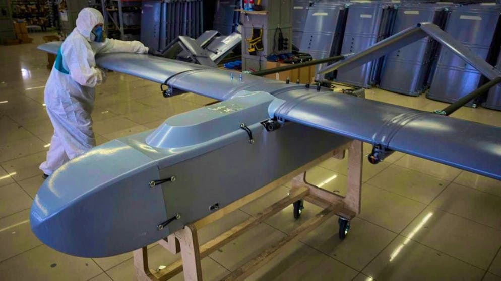 ARCHIVE - A worker inspects a combat drone at the secret Fire Point factory. (to dpa: "Kiev reports attacks on Russian drilling platforms") Photo: Efrem Lukatsky/AP/dpa