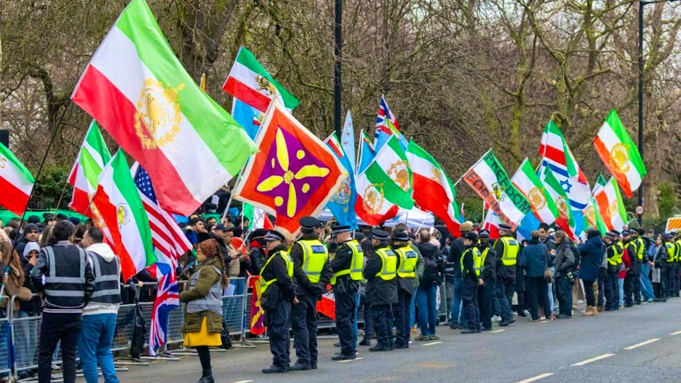 Protesters critical of the regime demonstrate in front of the Iranian embassy in London.