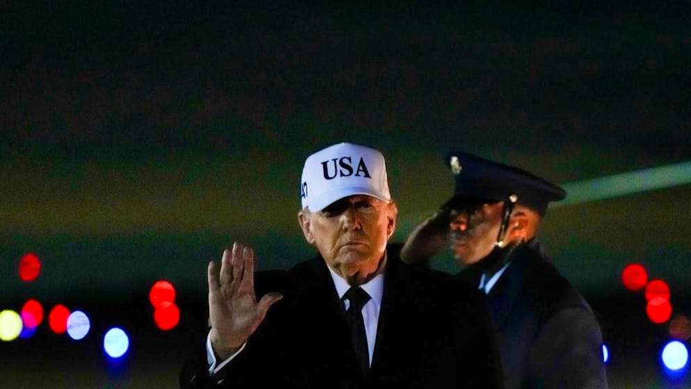 US President Donald Trump waves after his arrival in Air Force One from Florida at Joint Base Andrews. Photo: Julia Demaree Nikhinson/AP/dpa