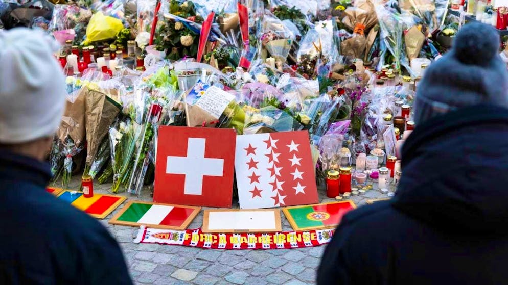 Flowers and candles near the bar "Le Constellation" Crans-Montana VS.