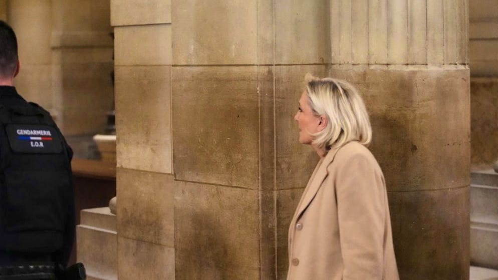 Marine Le Pen, leader of the French far-right party Rassemblement National (RN), arrives for a hearing in her appeal case on suspicion of embezzling EU funds at the Paris courthouse. Photo: Christophe Ena/AP/dpa