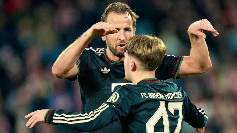 Harry Kane celebrates Lennart Karl's goal against Cologne.
