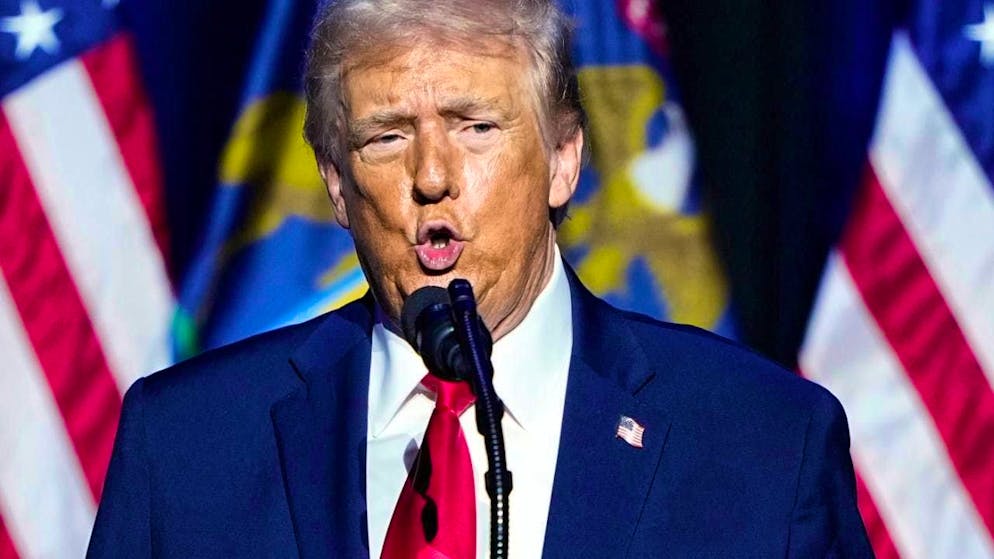 US President Donald Trump speaks at the Detroit Economic Club. Photo: Ryan Sun/AP/dpa