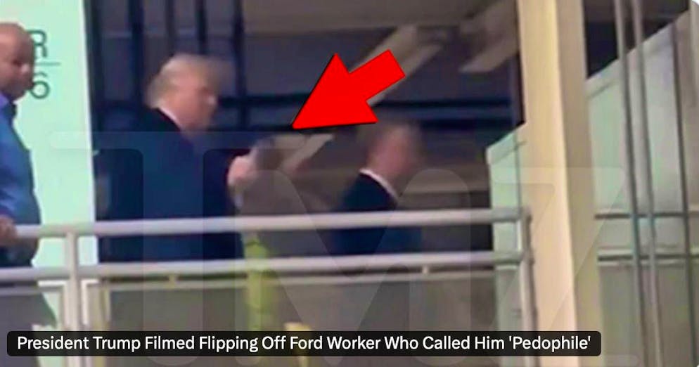 US President Donald Trump is provoked into obscene words and gestures by a heckler during a visit to a Ford plant on Tuesday.
