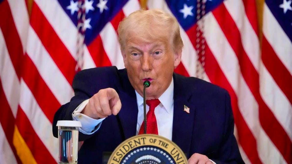 US President Donald Trump speaks in the East Room of the White House. Photo: Alex Brandon/AP/dpa