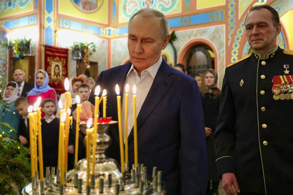 Three worries and a stroke of luck for Vladimir Putin - Gallery. With what request did the Kremlin leader light this candle on Orthodox Christmas? (Archive picture)