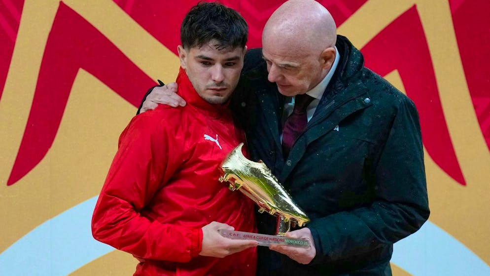 Gianni Infantino comforts the tragic hero.