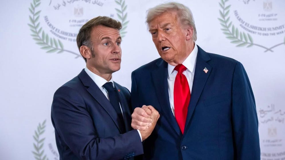 ARCHIV - US-Präsident Donald Trump und Emmanuel Macron, Präsident von Frankreich. Foto: Michael Kappeler/dpa