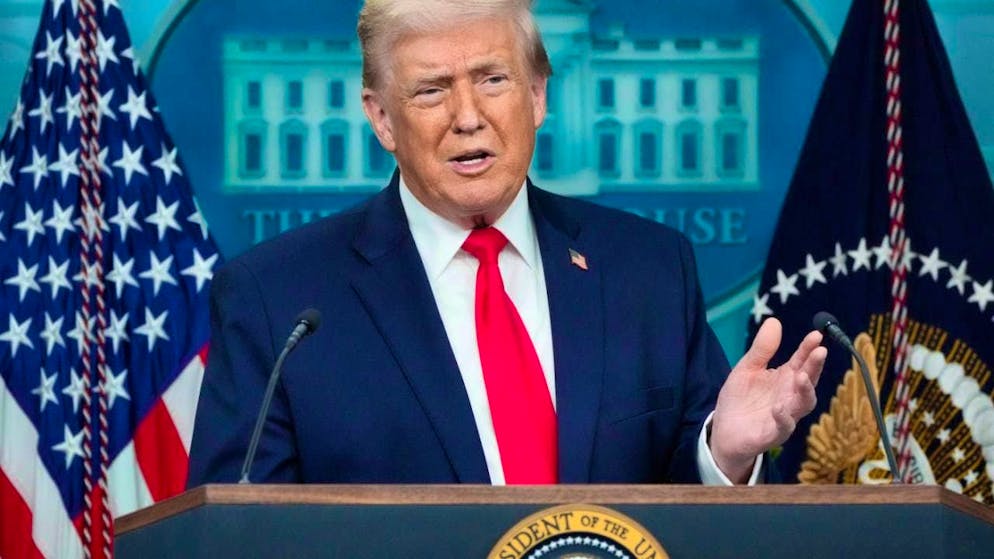 US President Donald Trump speaks during a press briefing at the White House in Washington.