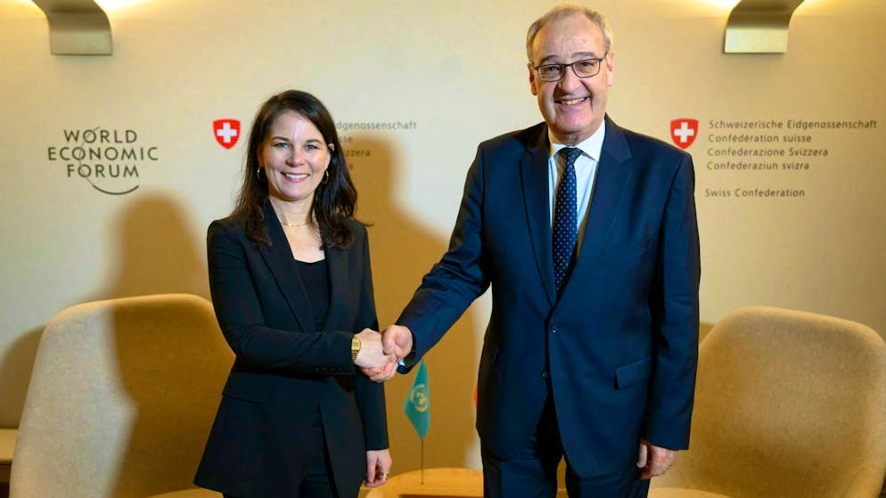 President Guy Parmelin (right) with Annalena Baerbock, President of the UN General Assembly and former German Foreign Minister, in Davos on Monday.