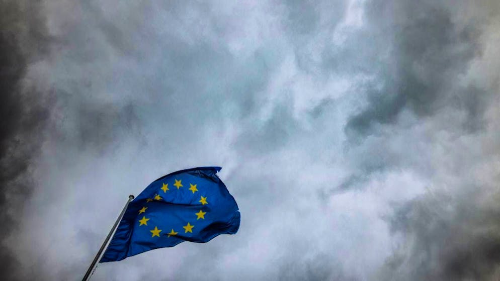 ARCHIVE - The flag of the European Union flies in the wind in front of the European Parliament building. Photo: Philipp von Ditfurth/dpa