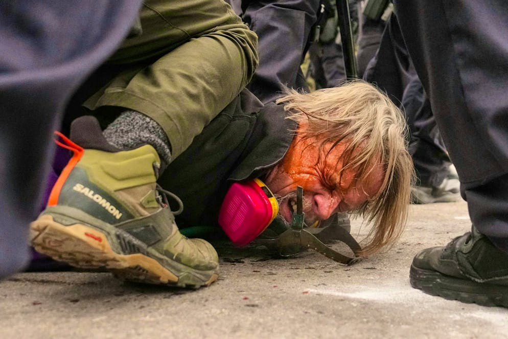 John Abernathy is arrested by ICE agents in Minnepolis, Minnesota, on Jan. 15.