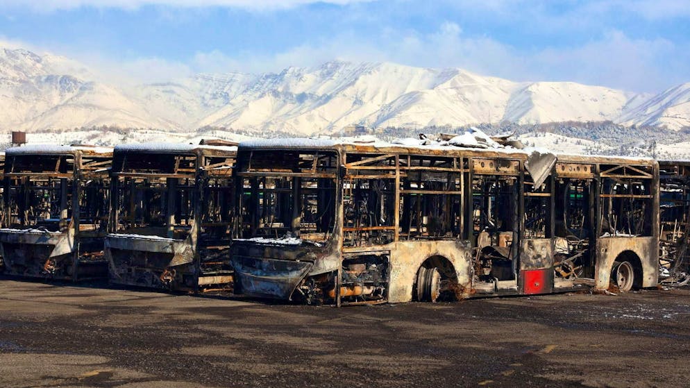 Buses burned out during the protests in Tehran (January 21, 2026).