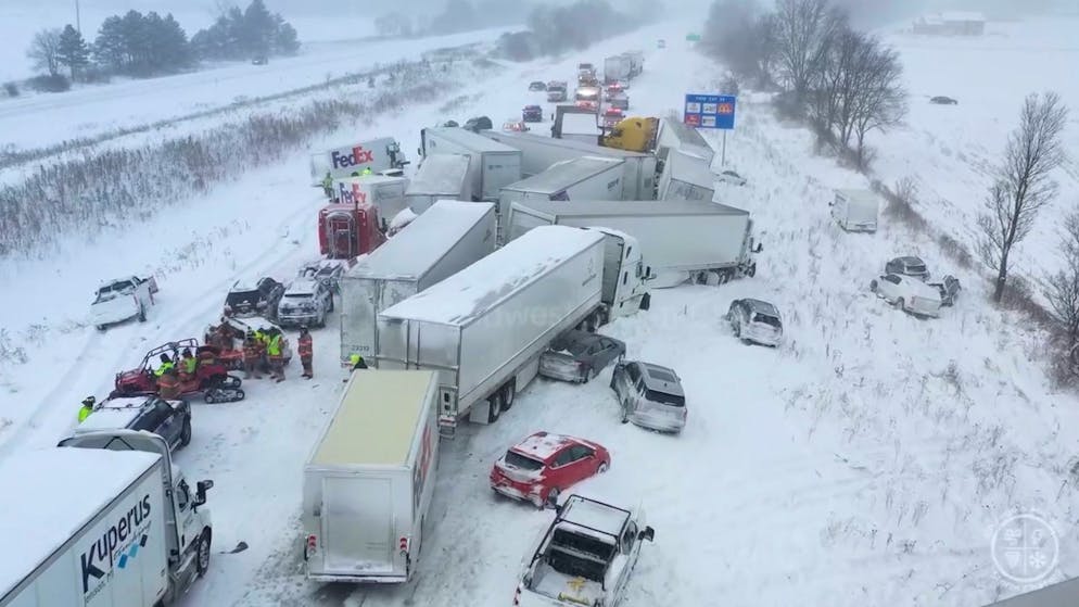 Pileup. Over 100 vehicles crash into each other during snowstorm