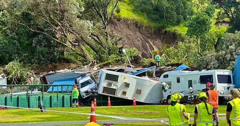 Rescue workers on Mount Maunganui search for missing people. 