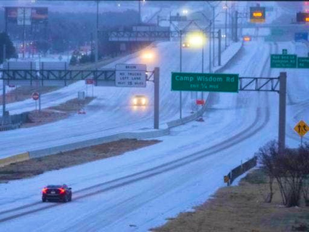 Winter storm moves across the USA. Snow-covered Highway 67 in Dallas.