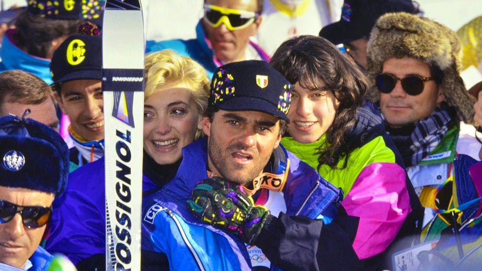 1992 Olympic Games: Tomba cheers with his fans at the finish line.