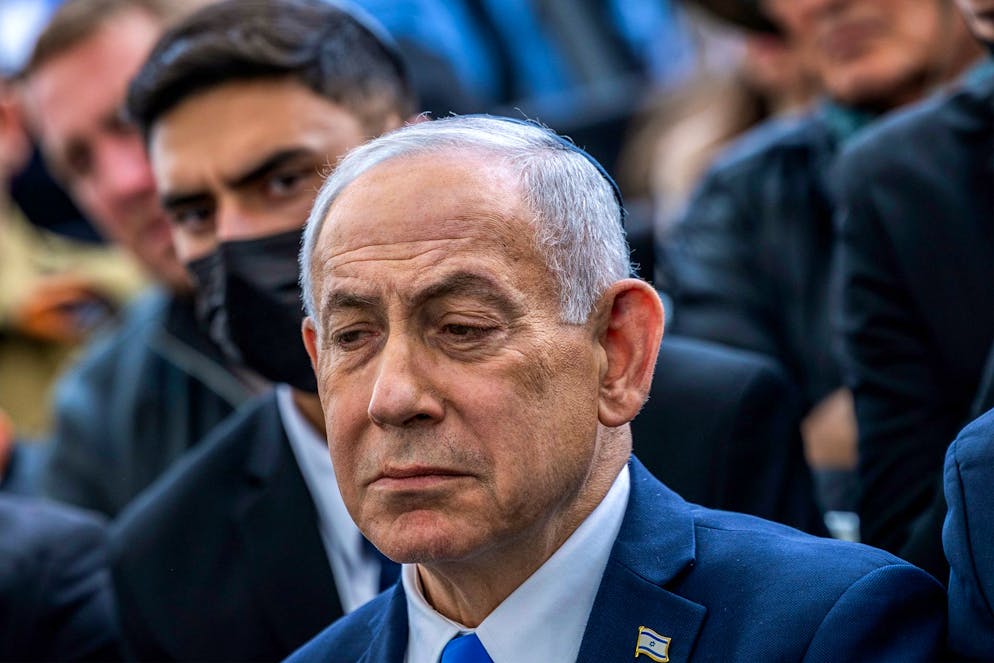Israel's Prime Minister Benjamin Netanyahu reacts during the funeral of Israeli hostage Ran Gvili, whose remains were brought back to Israel, in the southern town of Meitar on Wednesday, Jan. 28, 2026.(Chaim Goldberg/Pool Photo via AP)