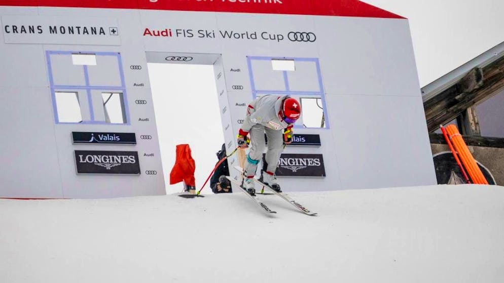 World Championships dress rehearsal in Crans-Montana with a special setting - Gallery. Corinne Suter pushes off from the start house while inspecting the downhill course.