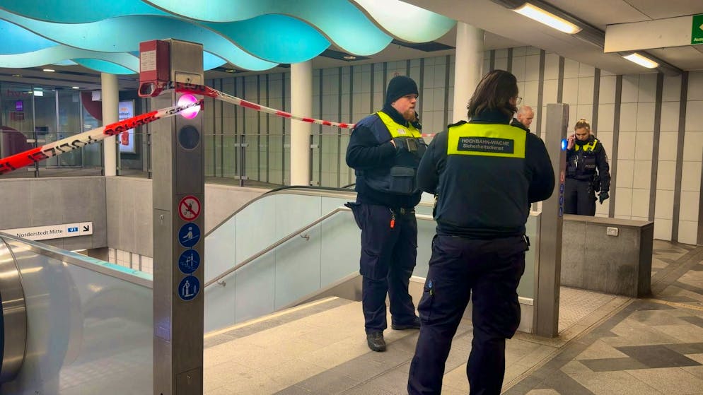 Police officers work after the fatal incident at Hamburg's Wandsbek Markt subway station on Thursday evening.