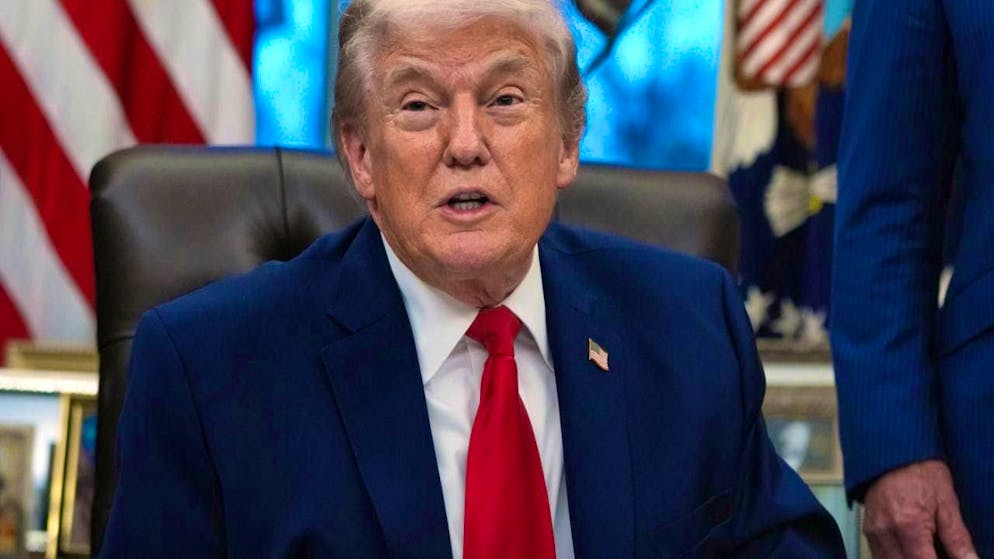 US President Donald Trump speaks in the Oval Office of the White House. Photo: Allison Robbert/AP/dpa